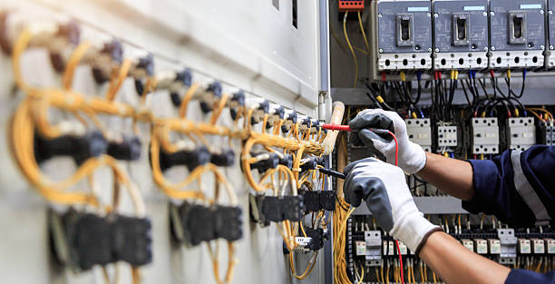 Professional Electrician technician working in Warm Mineral Springs, FL